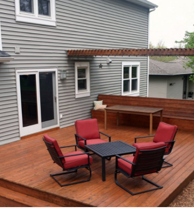 Deck installed in backyard in Cheyenne Wyoming with patio furniture.